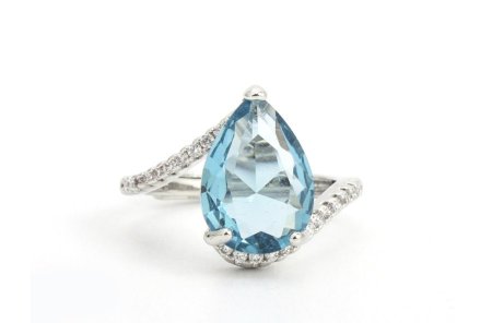 خاتم لوزة ازرق زركون فضي