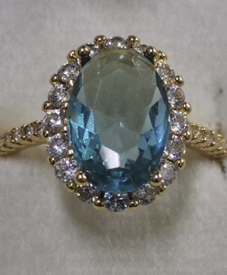 خاتم ذهبي فاخر حجر دائري ازرق