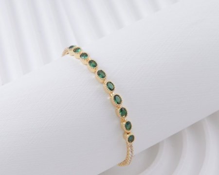 اسوارة تنس زركون بيضاوي اخضر ذهبي